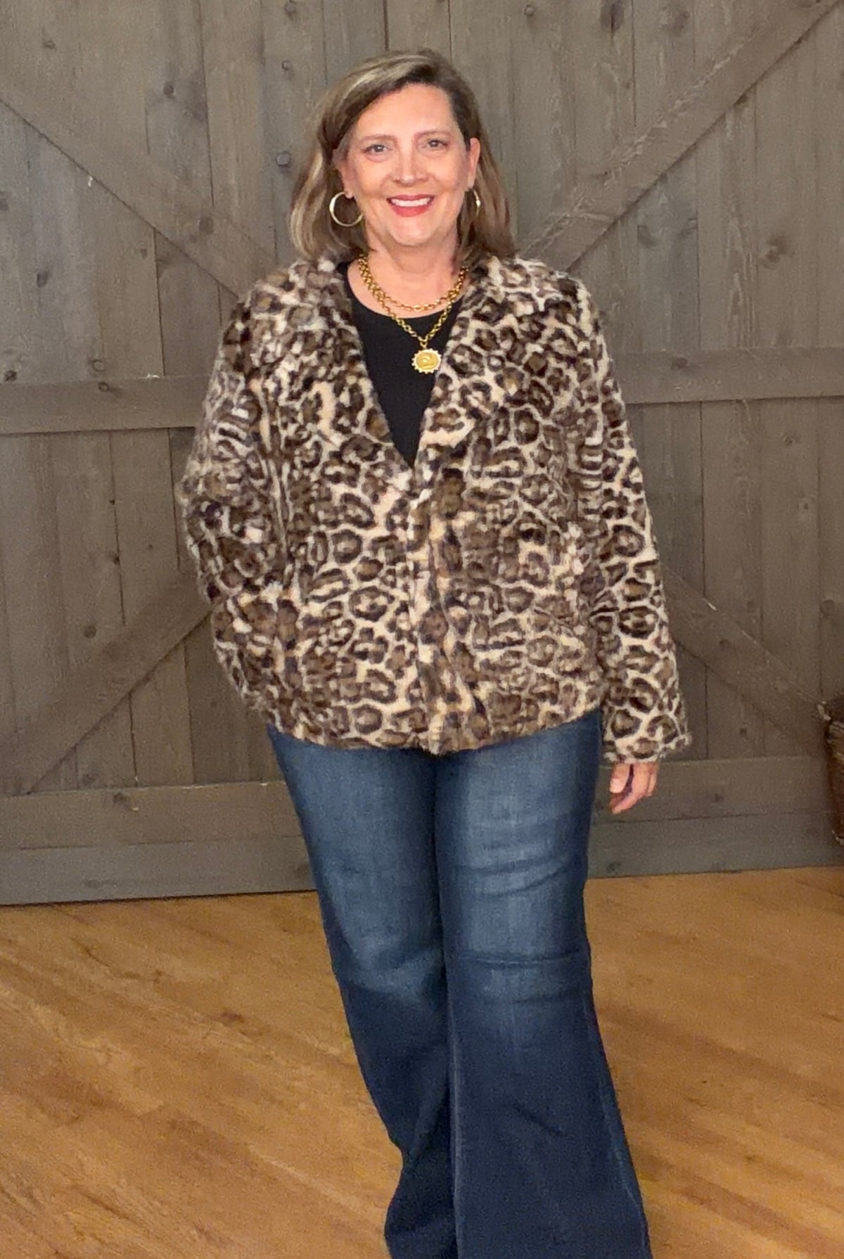Woman in Wildly Chic Leopard Jacket and jeans