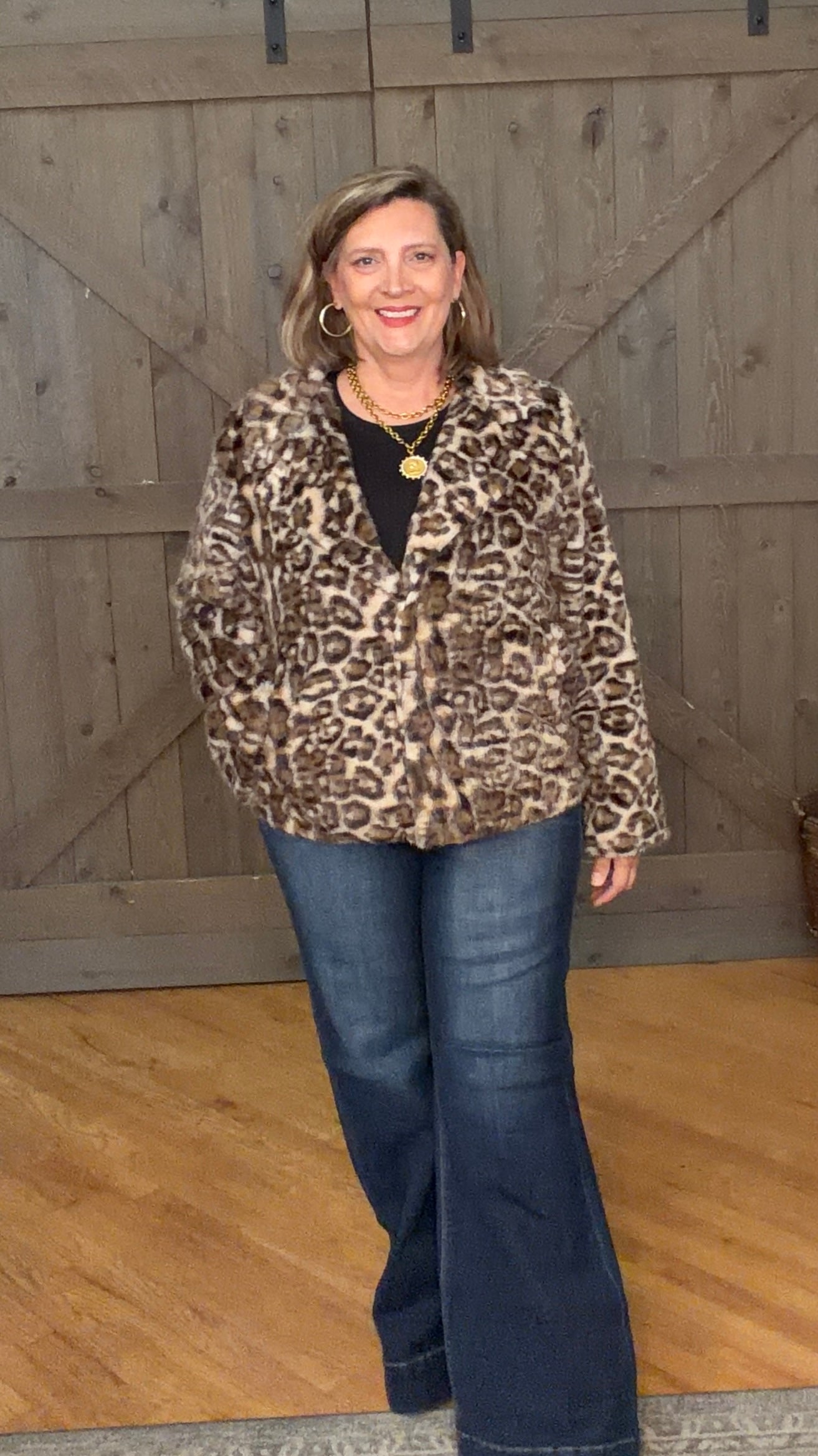 Woman in Wildly Chic Leopard Jacket and jeans