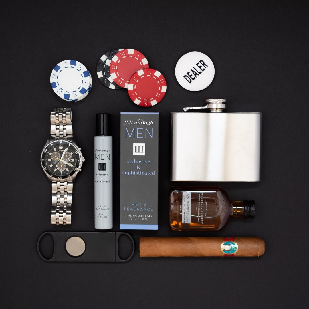 Collection of men's accessories and items on a black background